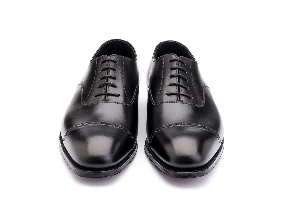 Front view of Crockett & Jones Belgrave quarter brogue oxford shoes in black calf