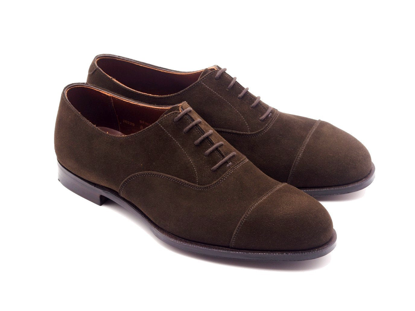 Front angle view of Crockett & Jones Bendigo plain captoe oxford shoes in dark brown suede