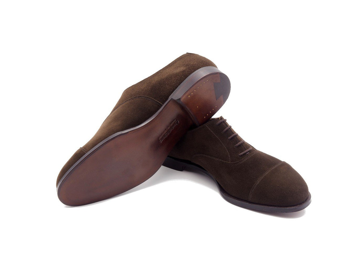 Leather sole of Crockett & Jones Bendigo plain captoe oxford shoes in dark brown suede