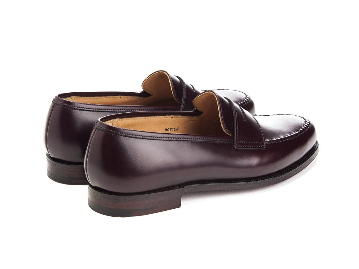 Back angle view of Crockett & Jones Boston penny loafers in burgundy cavalry calf
