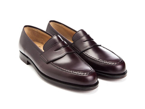 Front angle view of Crockett & Jones Boston penny loafers in burgundy cavalry calf