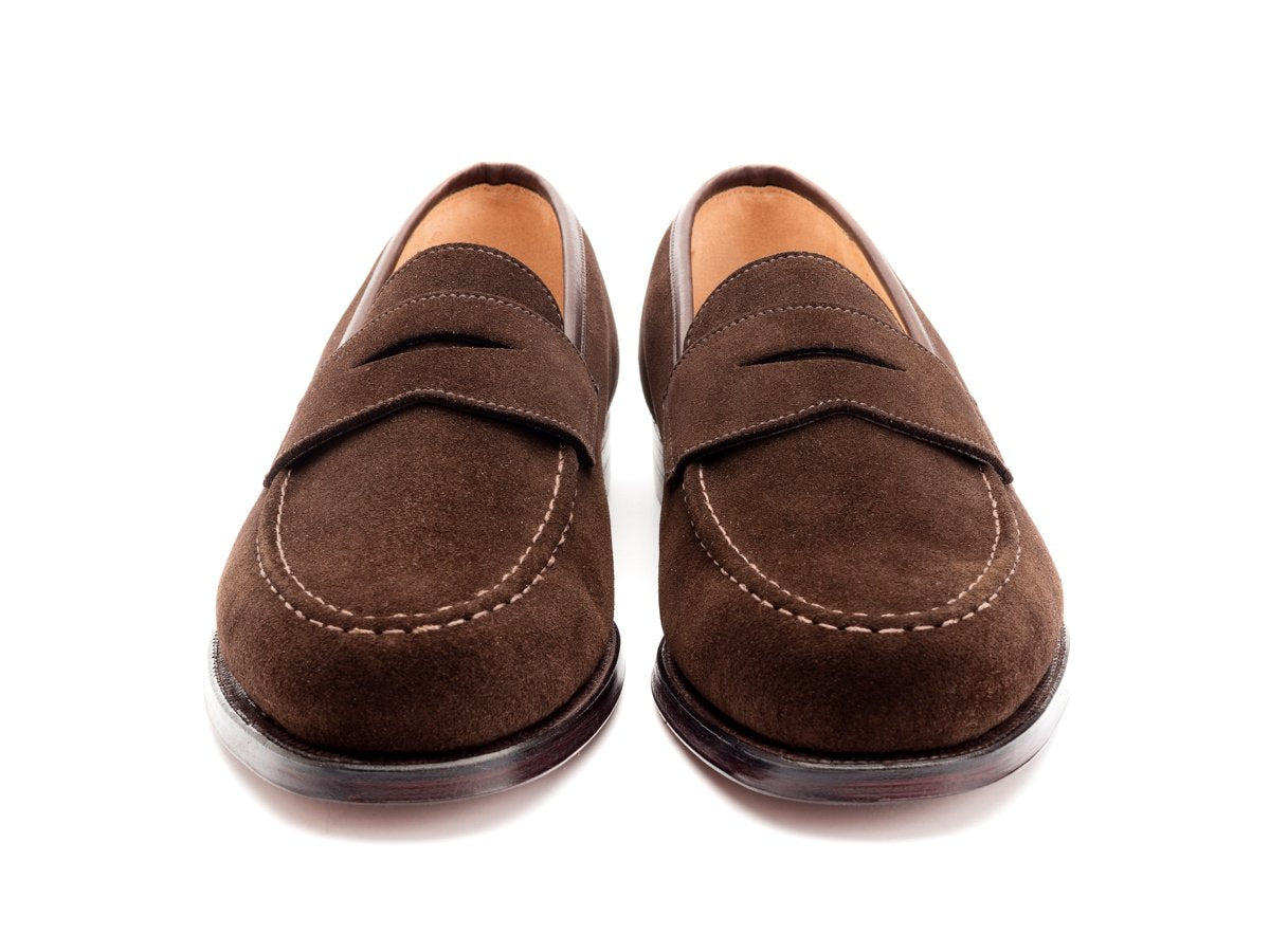 Front view of Crockett & Jones Boston penny loafers in dark brown suede