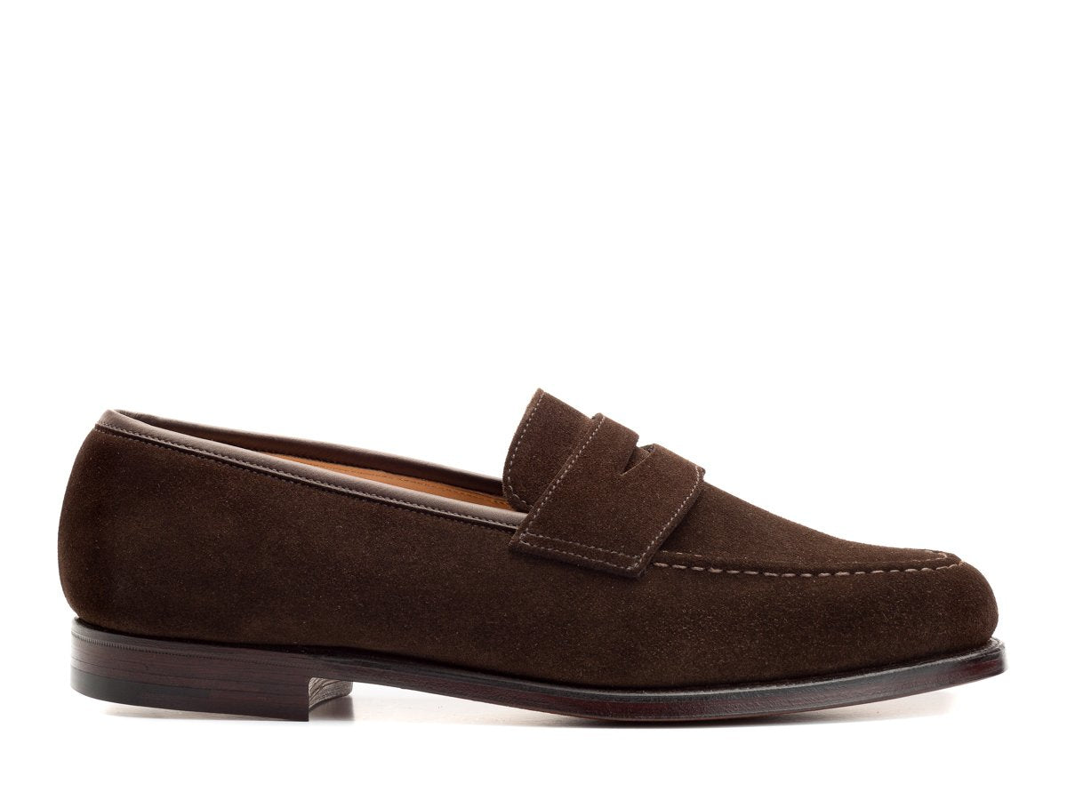 Side view of Crockett & Jones Boston penny loafers in dark brown suede