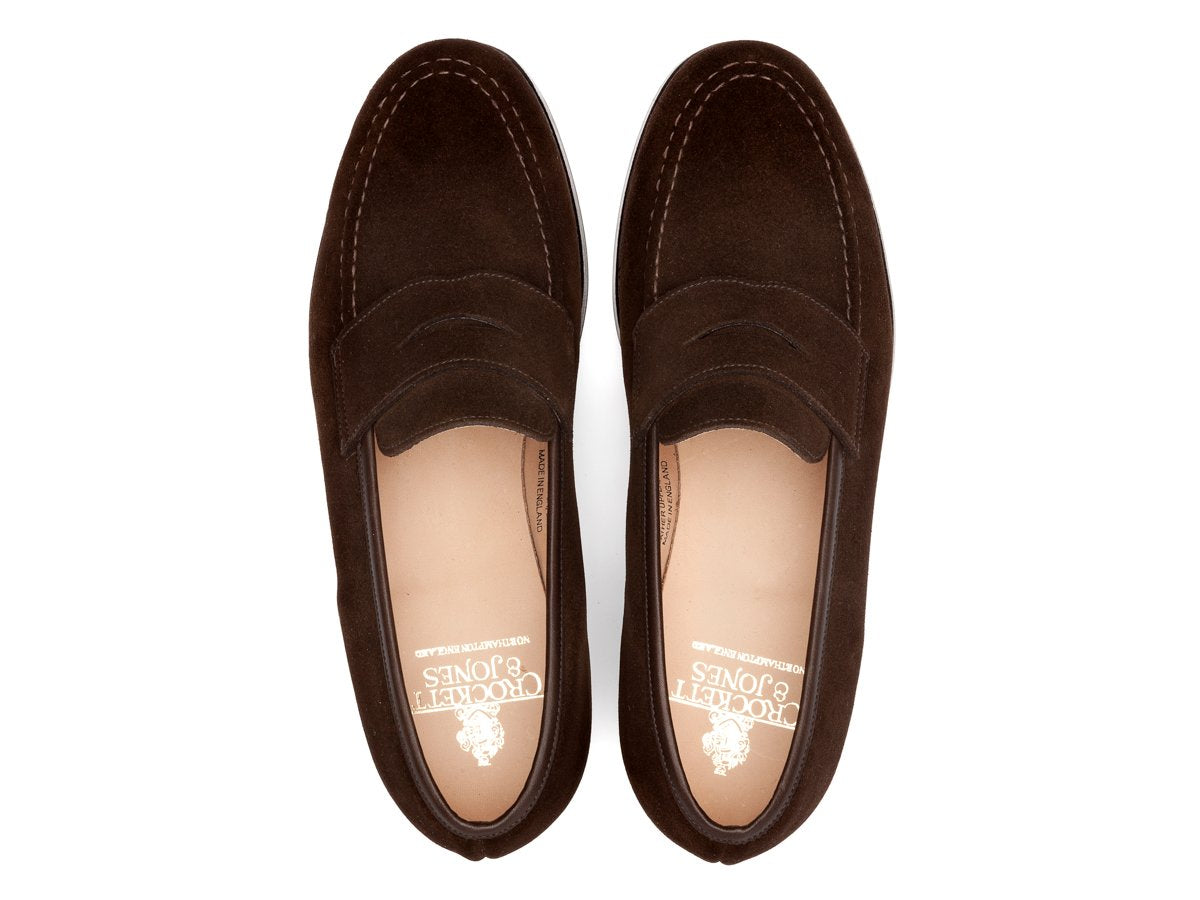 Top view of Crockett & Jones Boston penny loafers in dark brown suede