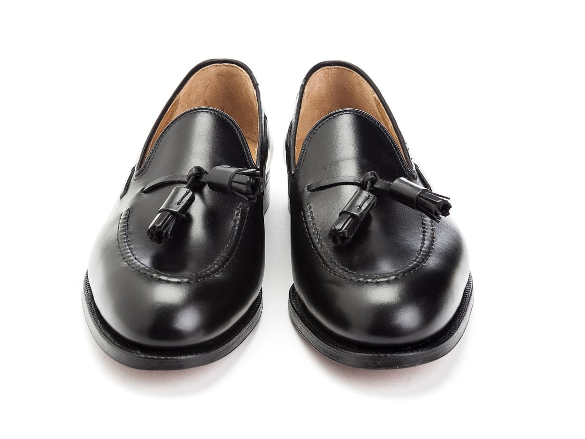 Front view of Crockett & Jones Cavendish tassel loafers in black calf