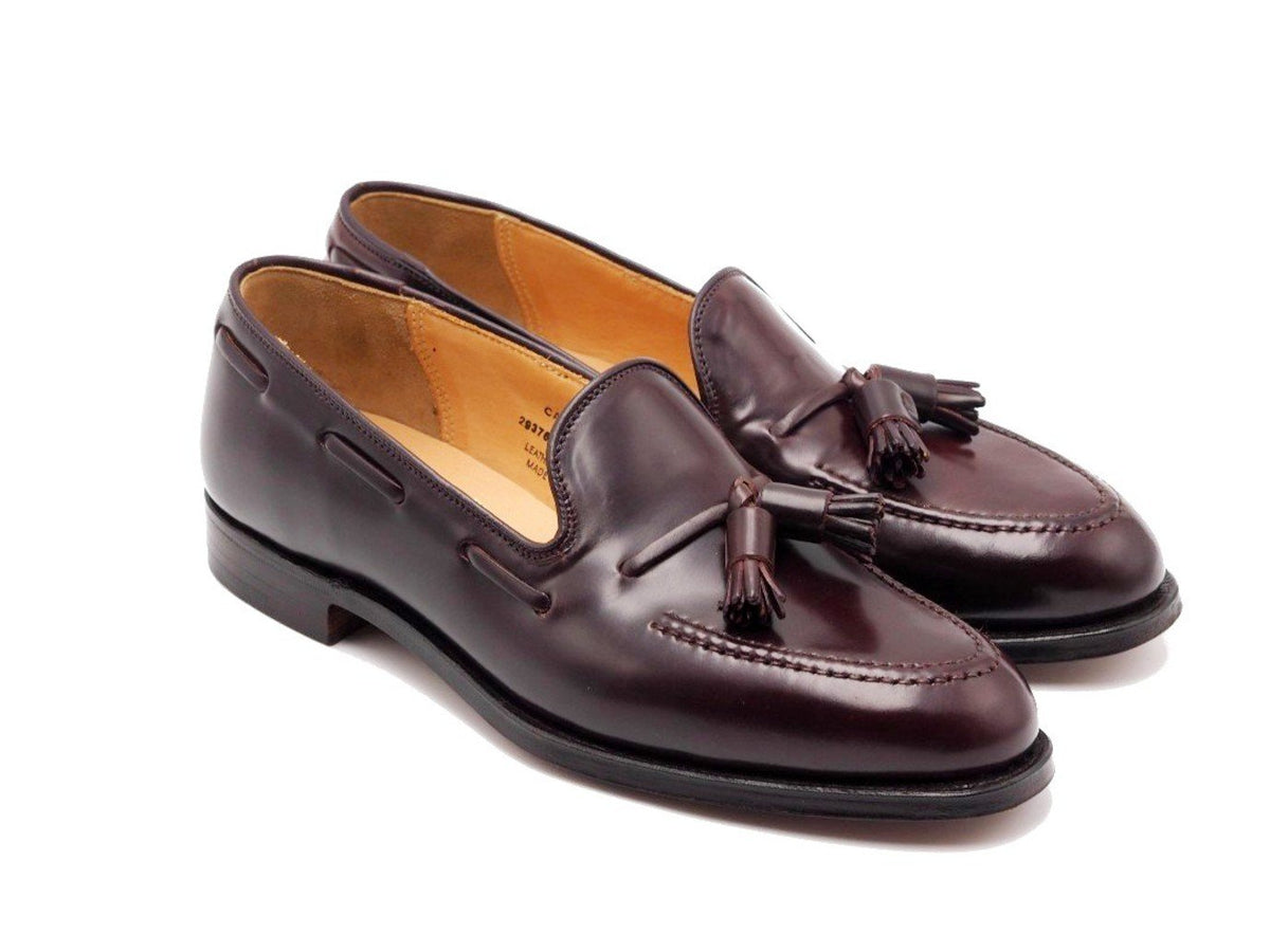 Front angle view of Crockett & Jones Cavendish tassel loafers in burgundy shell cordovan