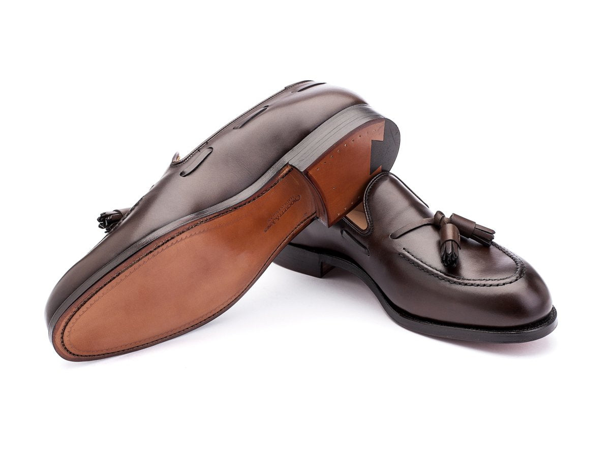 Leather sole of Crockett & Jones Cavendish tassel loafers in dark brown burnished calf