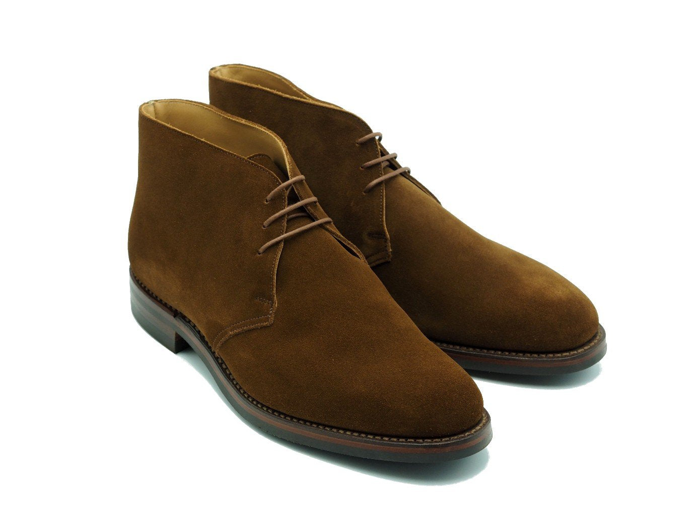Front angle view of Crockett & Jones Chiltern chukka boots in snuff suede