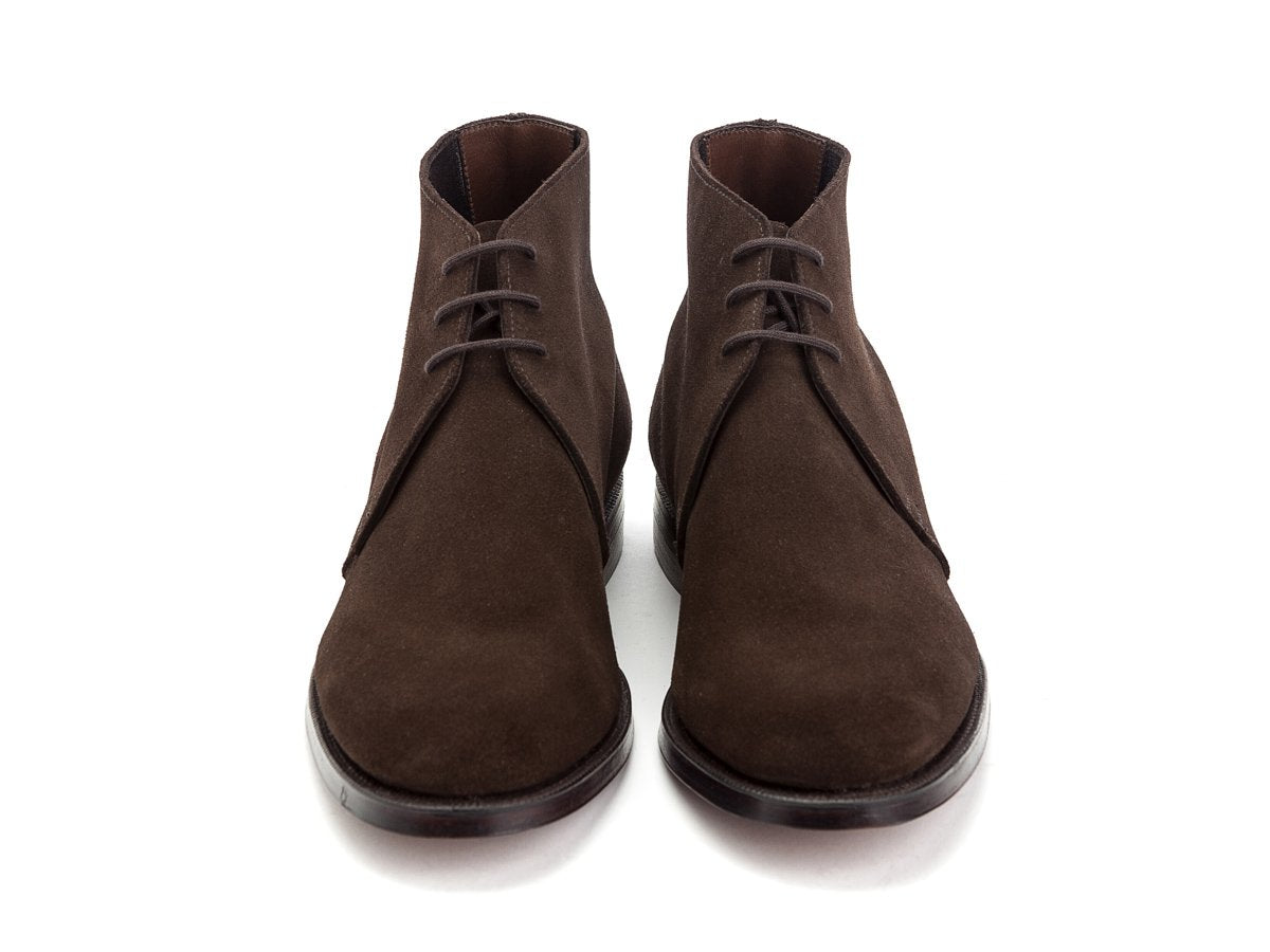 Front view of Crockett & Jones Chukka boots in dark brown suede