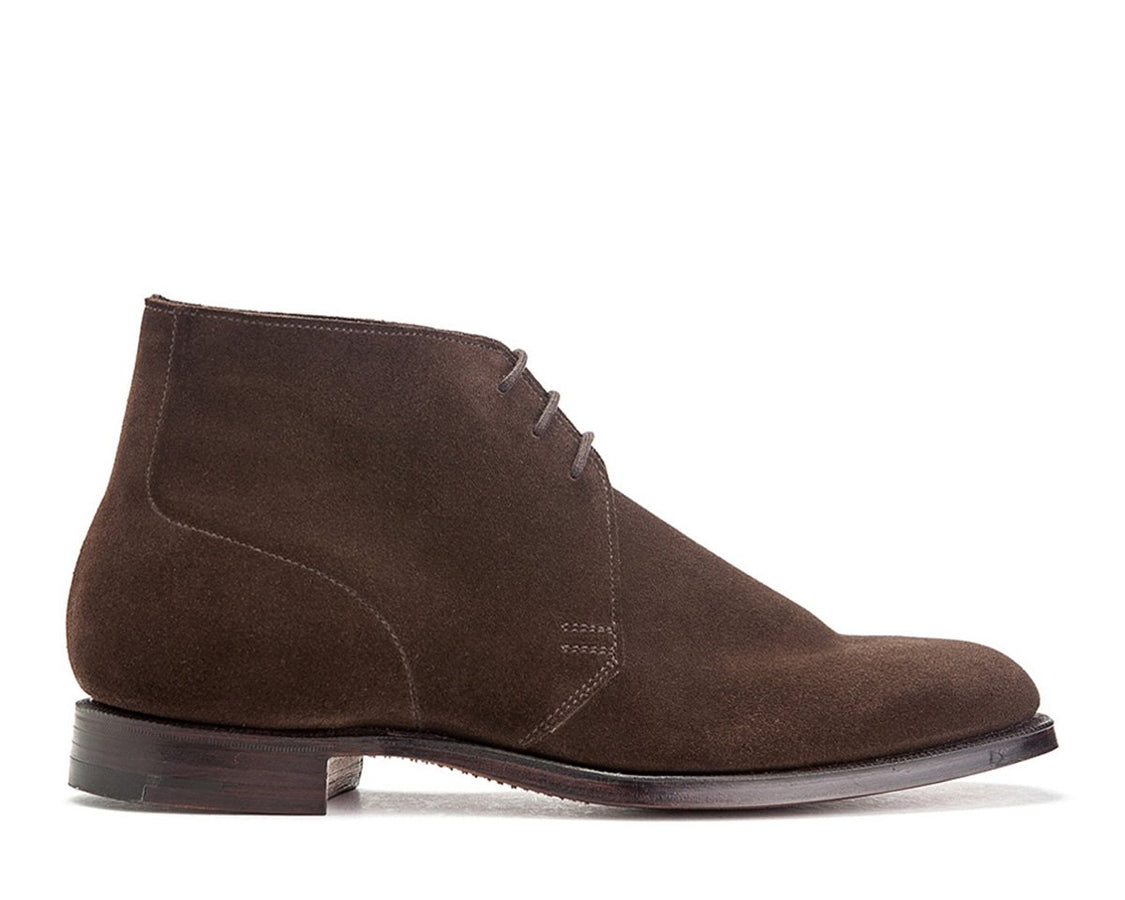 Side view of Crockett & Jones Chukka boots in dark brown suede