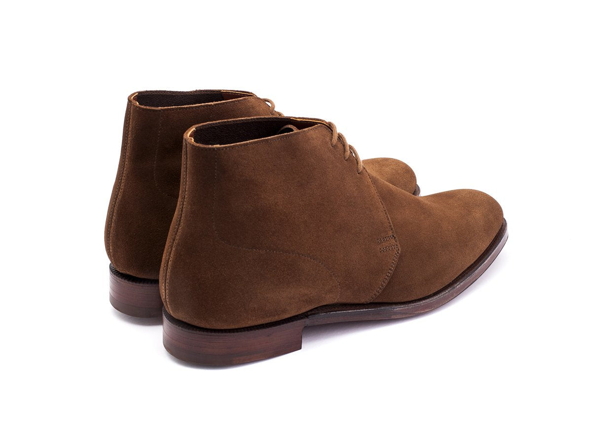 Back angle view of Crockett & Jones Chukka boots in snuff suede