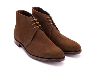 Front angle view of Crockett & Jones Chukka boots in snuff suede