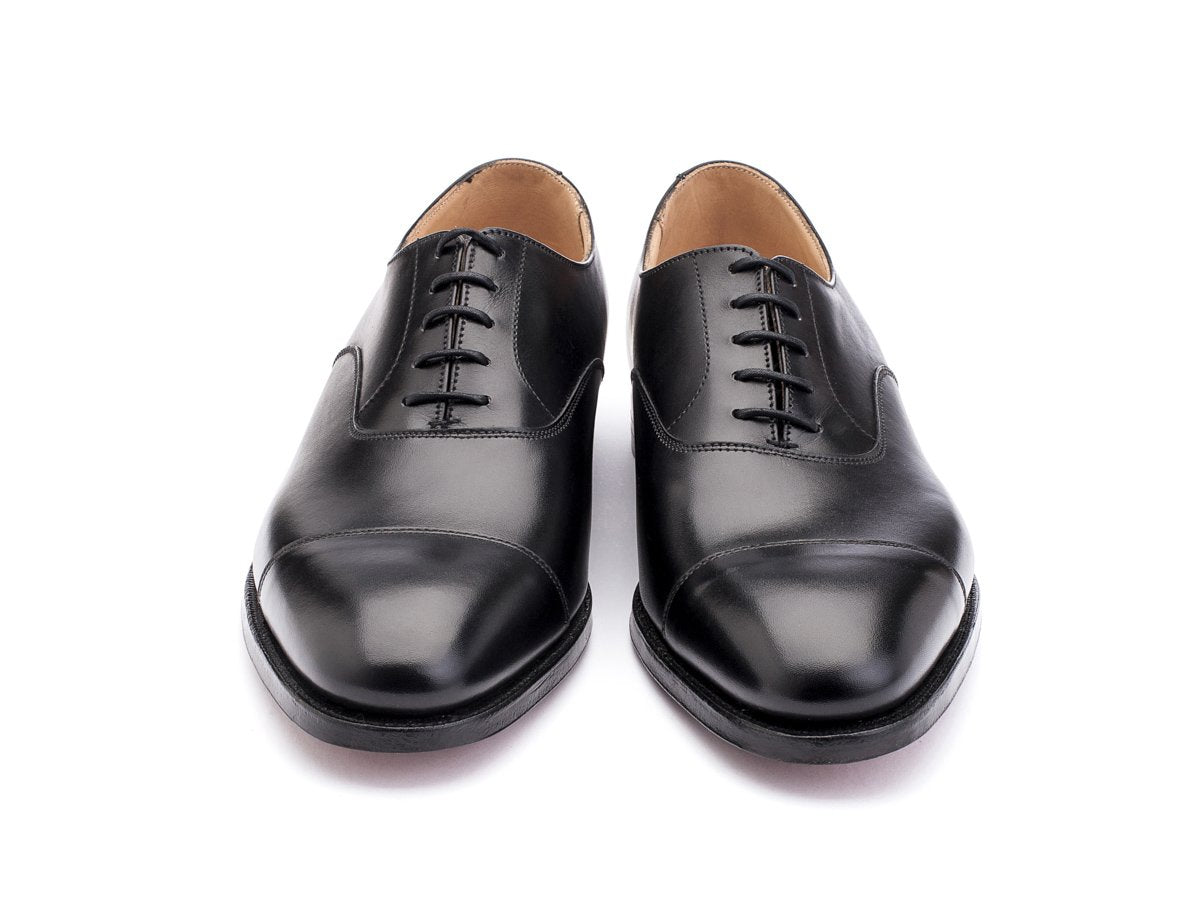 Front view of Crockett & Jones Connaught plain captoe oxford shoes in black calf