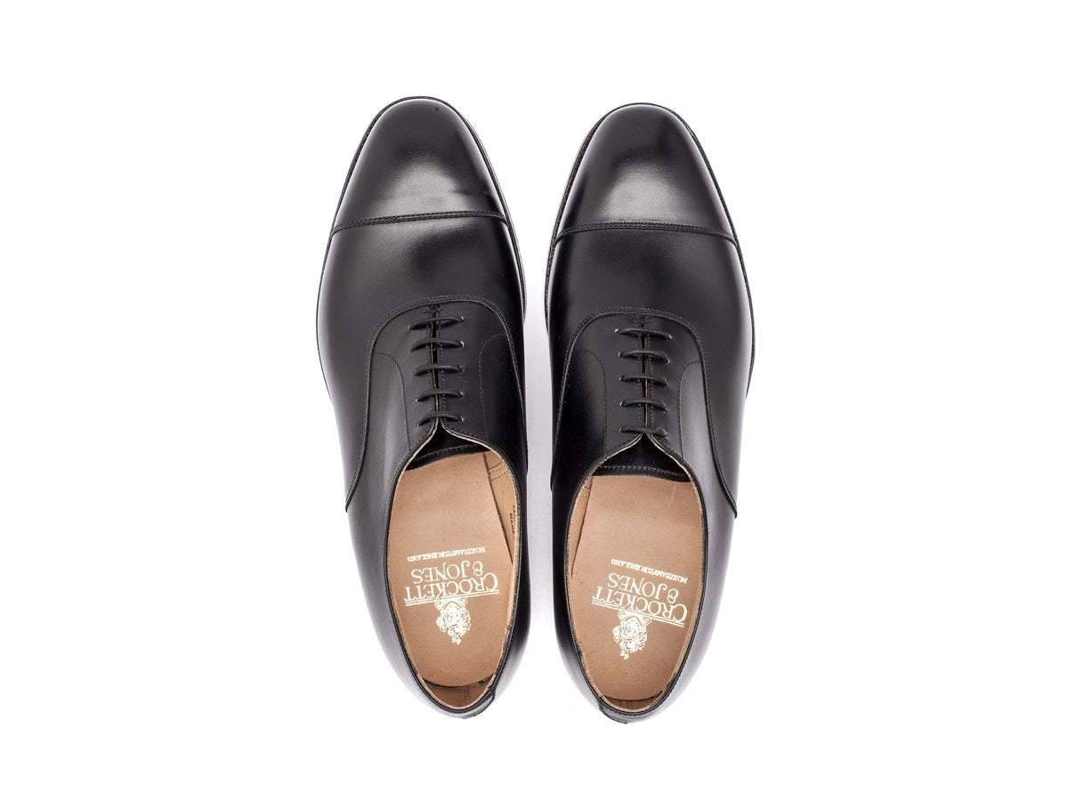 Top view of Crockett & Jones Connaught plain captoe oxford shoes in black calf