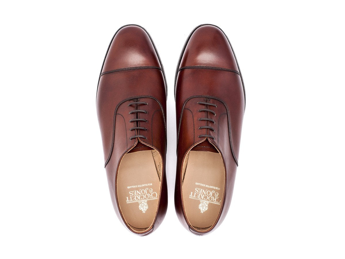 Top view of F width Crockett & Jones Connaught plain captoe oxford shoes in chestnut burnished calf