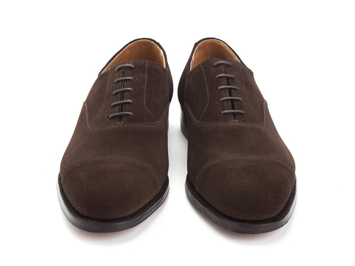 Front view of Crockett & Jones Connaught plain captoe oxford shoes in dark brown suede