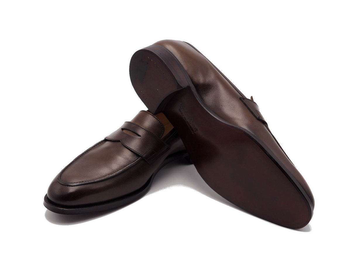Leather sole of Crockett & Jones Crawford penny loafers in dark brown antique calf