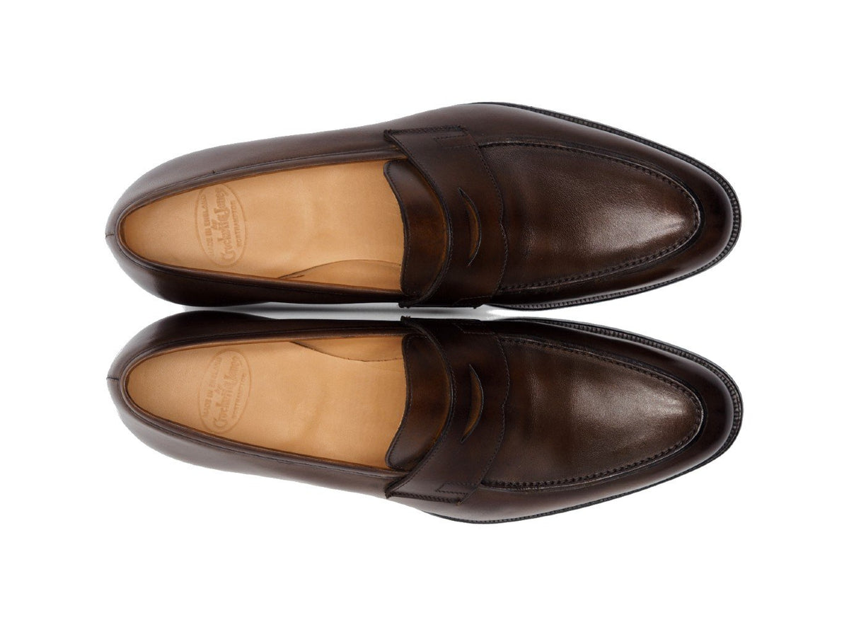 Top view of Crockett & Jones Crawford penny loafers in dark brown antique calf