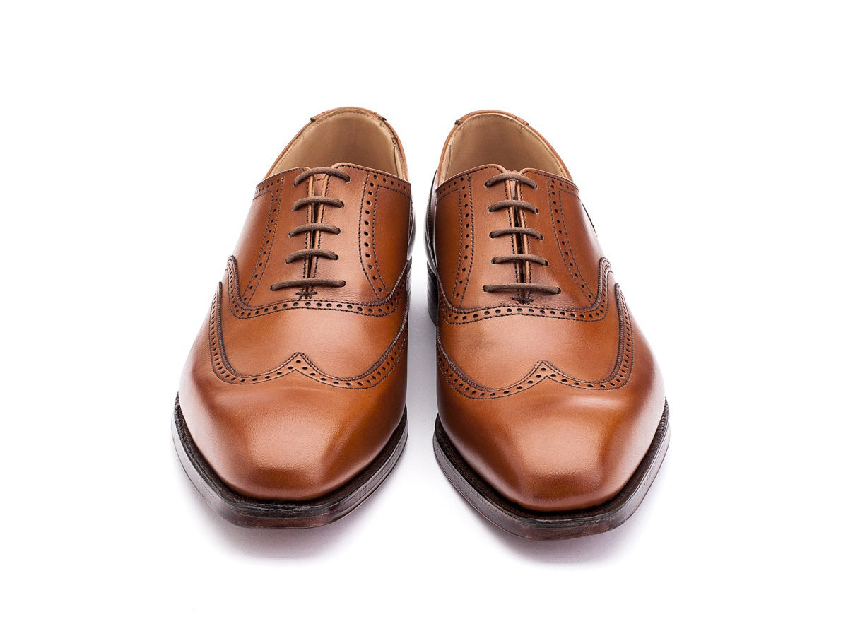 Front view of Crockett & Jones Drummond wingtip brogue oxford shoes in tan burnished calf
