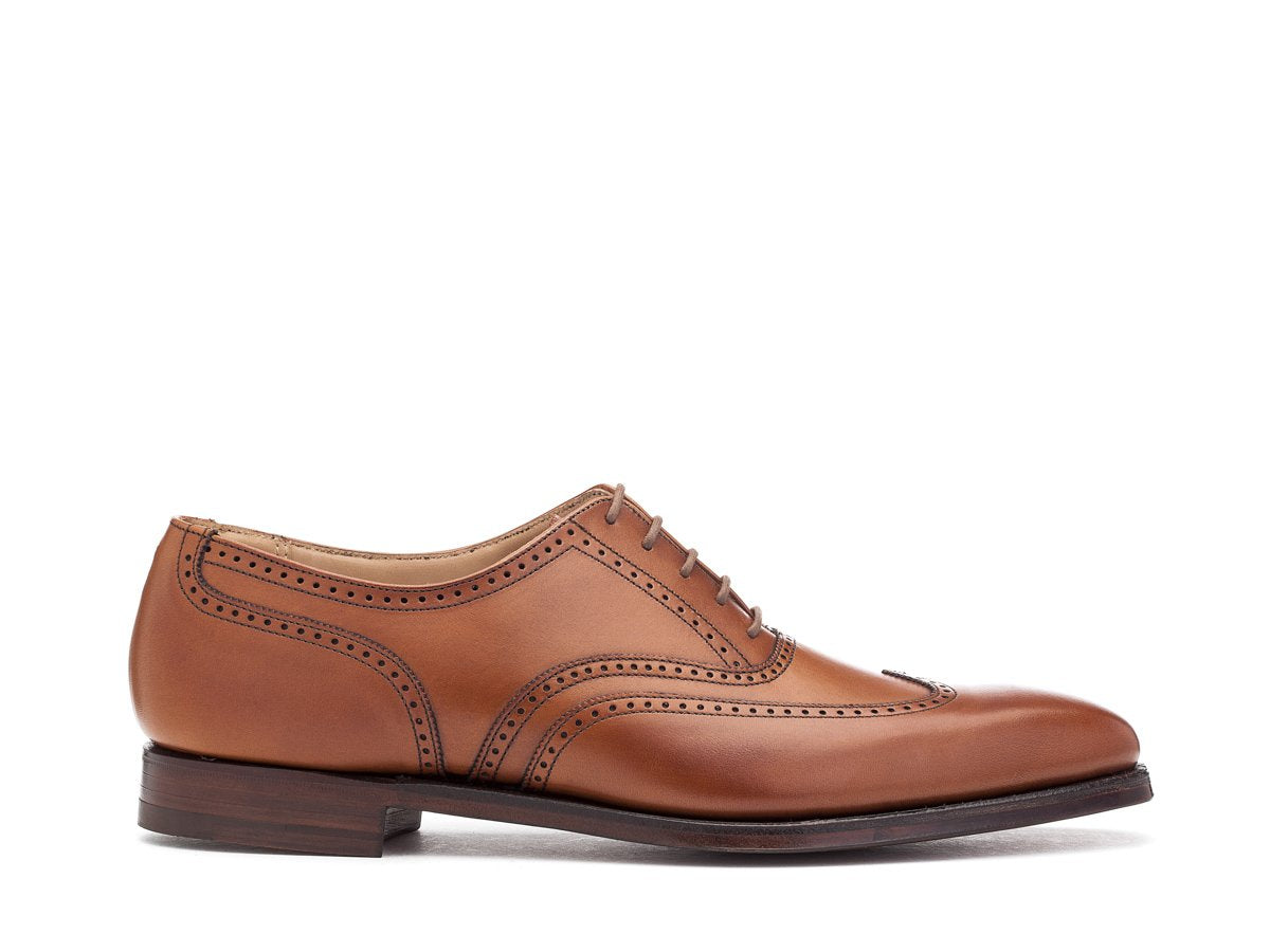 Side view of Crockett & Jones Drummond wingtip brogue oxford shoes in tan burnished calf