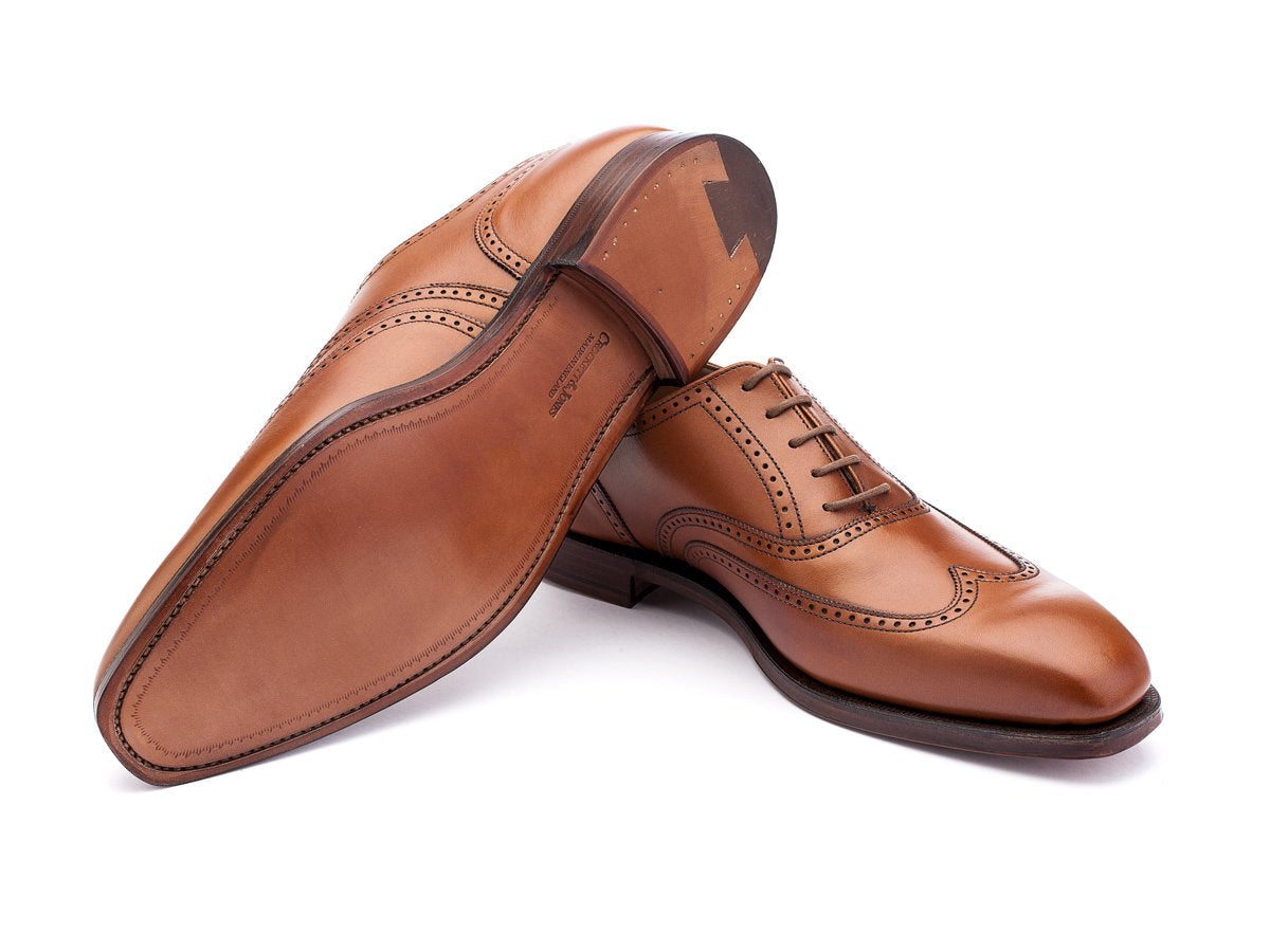 Leather sole of Crockett & Jones Drummond wingtip brogue oxford shoes in tan burnished calf