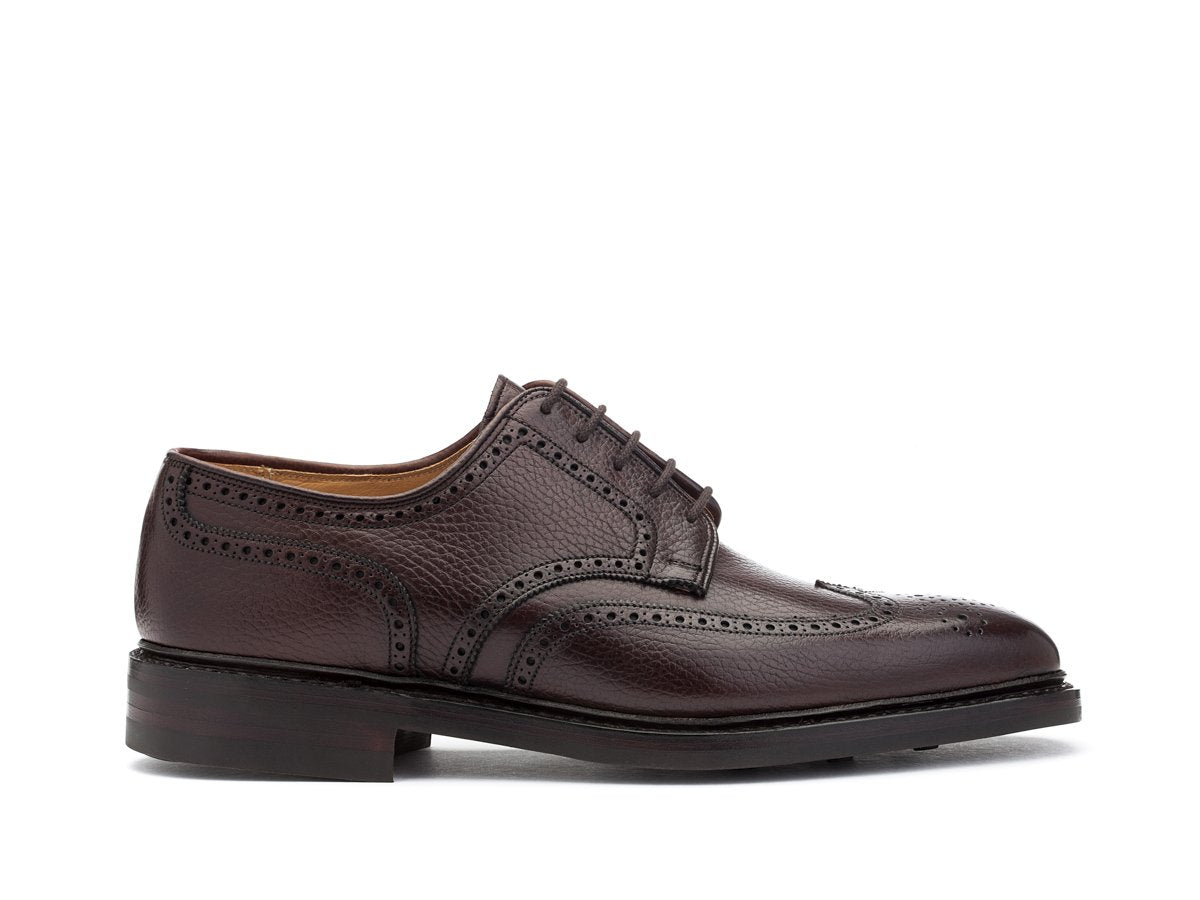 Side view of Crockett & Jones Exmoor wingtip full brogue derby shoes in dark brown country calf