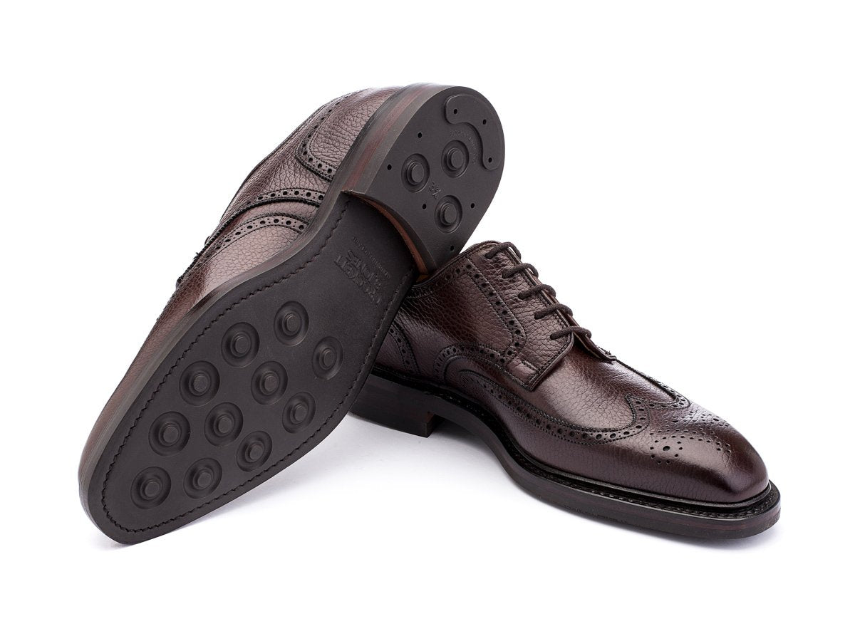 Dainite rubber sole of Crockett & Jones Exmoor wingtip full brogue derby shoes in dark brown country calf