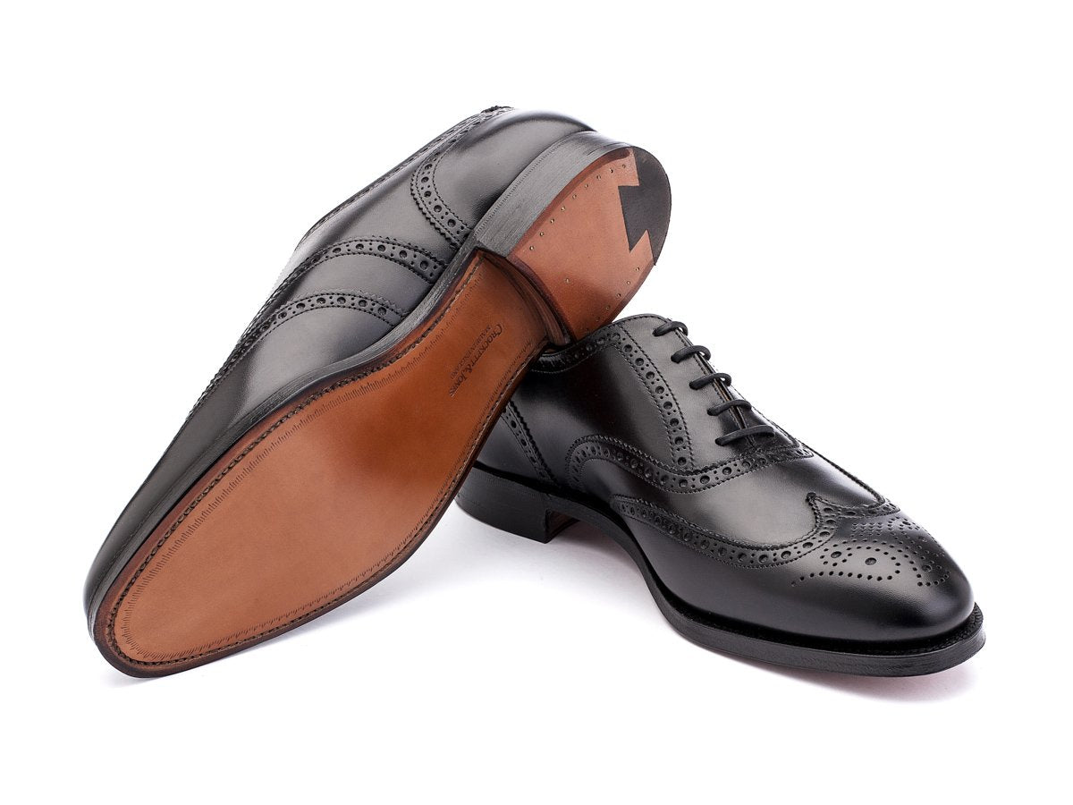 Leather sole of Crockett & Jones Finsbury wingtip full brogue oxford shoes in black calf