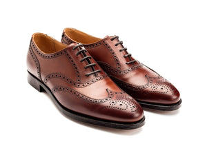 Front angle view of Crockett & Jones Finsbury wingtip full brogue oxford shoes in chestnut burnished calf