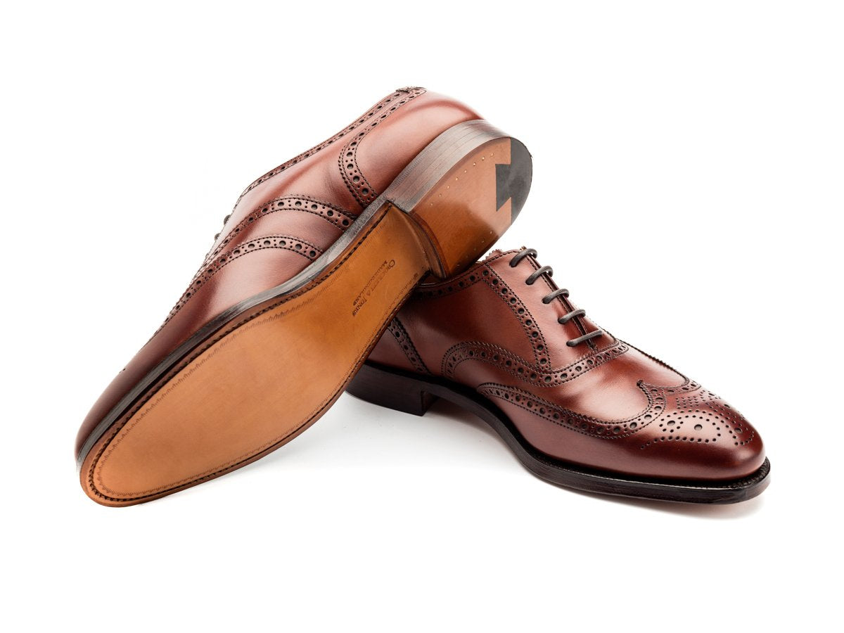 Leather sole of Crockett & Jones Finsbury wingtip full brogue oxford shoes in chestnut burnished calf