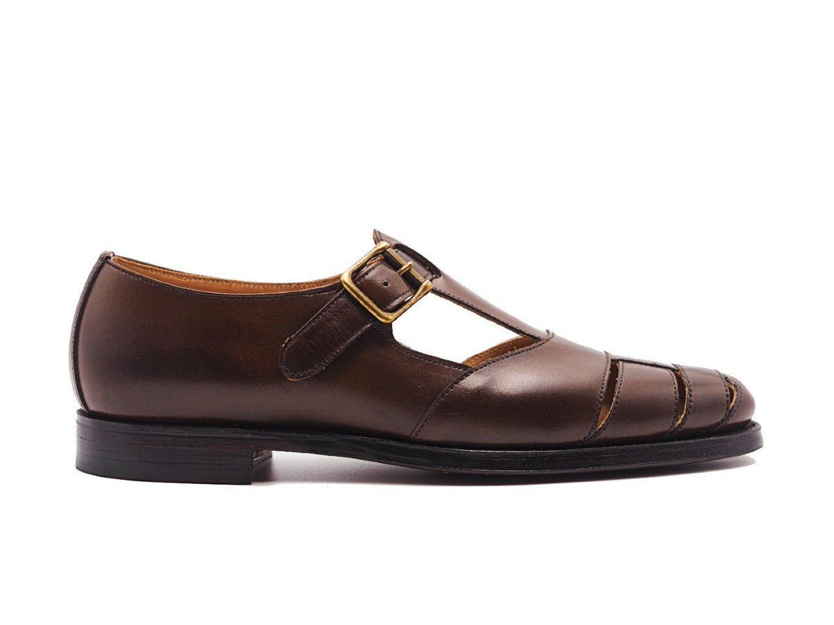 Side view of Crockett & Jones Fisherman sandals in dark brown burnished calf