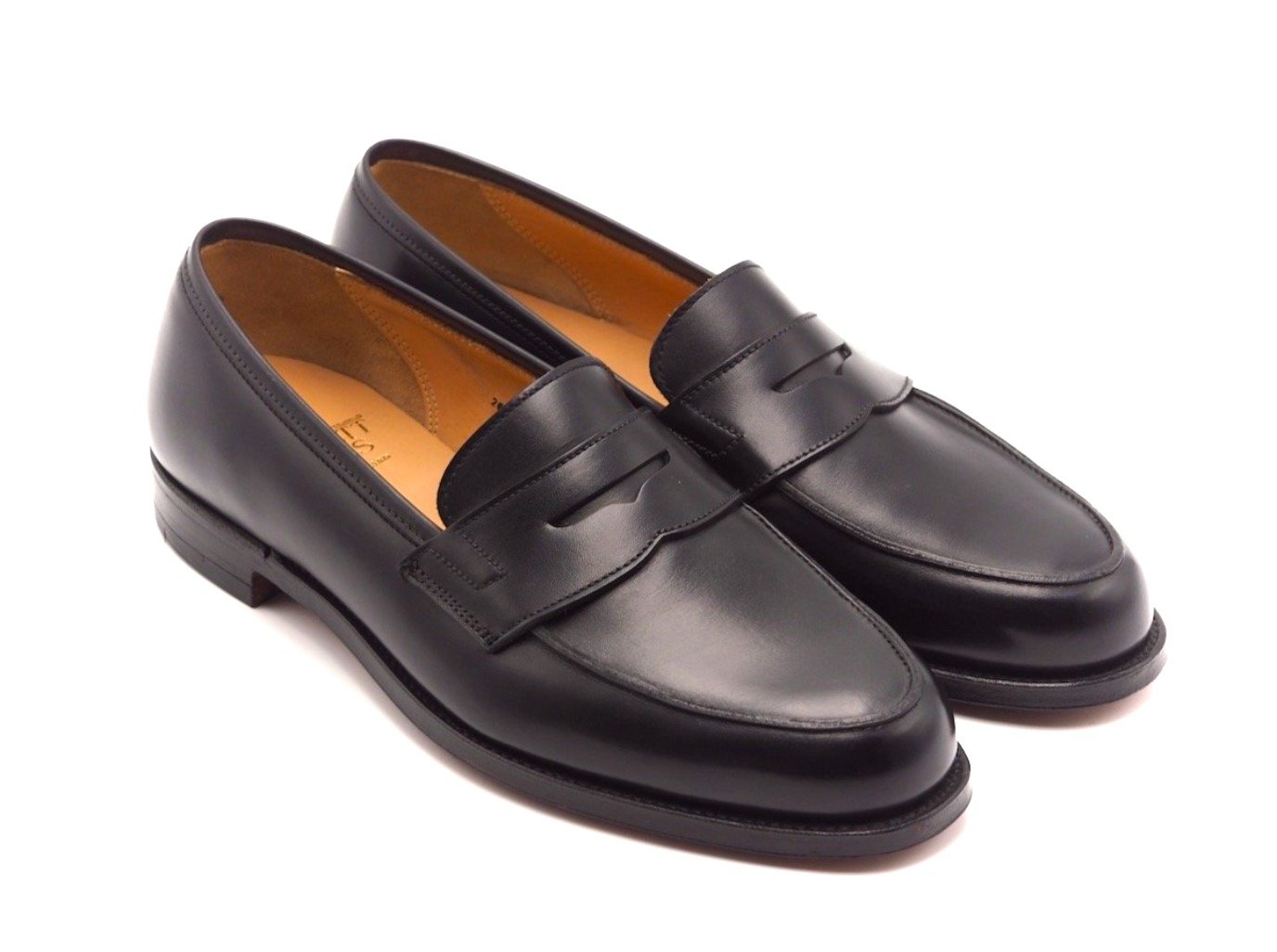 Front angle view of Crockett & Jones Grantham 2 penny loafers in black calf