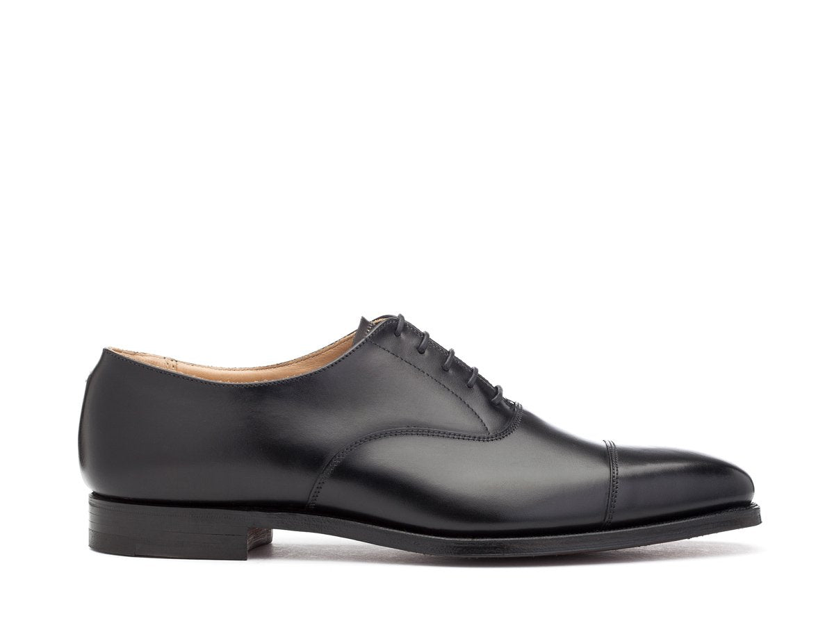 Side view of Crockett & Jones Hallam plain captoe oxford shoes in black calf