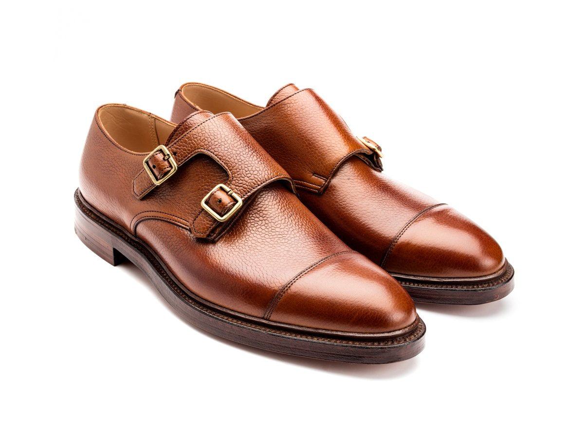 Front angle view of Crockett & Jones Harrogate captoe double monk strap shoes in tan scotch grain calf