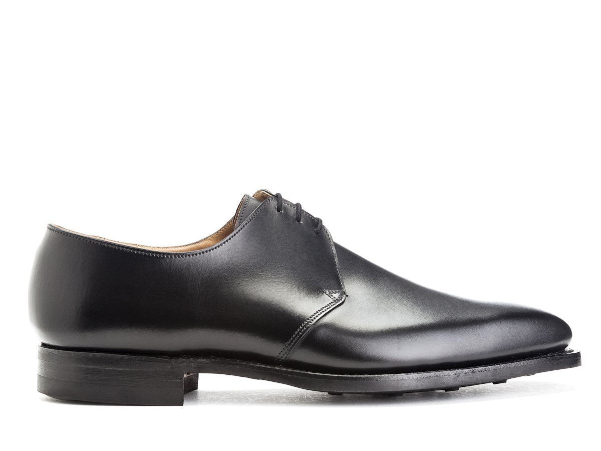 Side view of Crockett & Jones Highbury plain toe 3 eyelet derby shoes in black calf