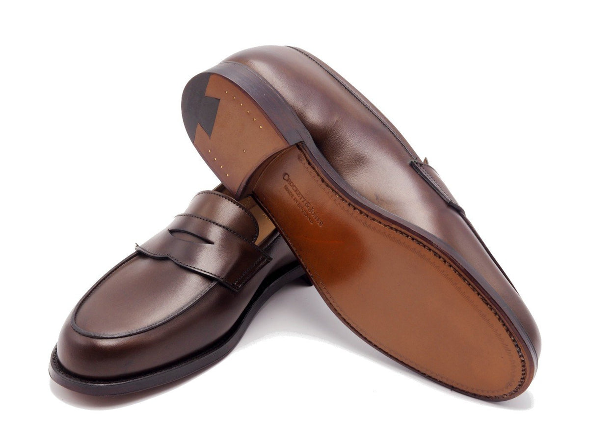Leather sole of Crockett & Jones Kirribilli penny loafers in dark brown burnished calf