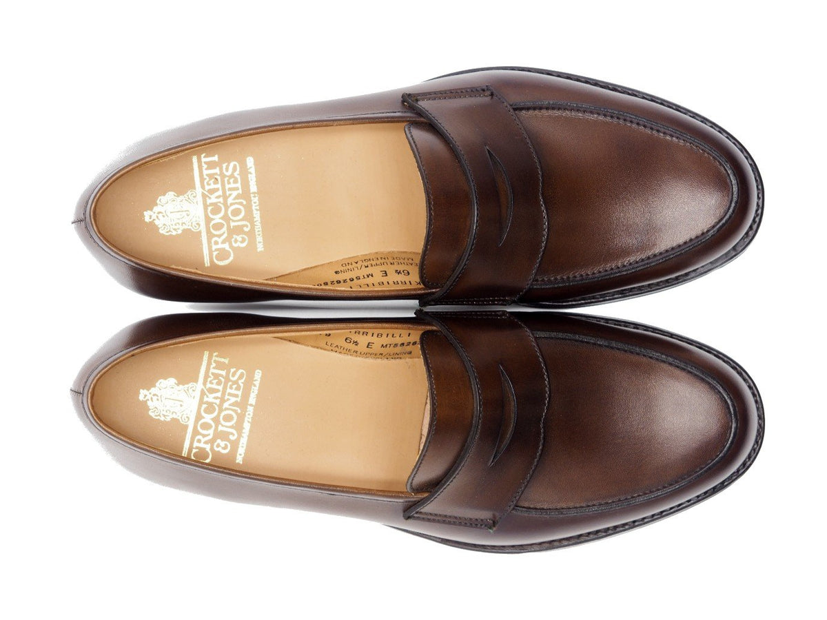 Top view of Crockett & Jones Kirribilli penny loafers in dark brown burnished calf