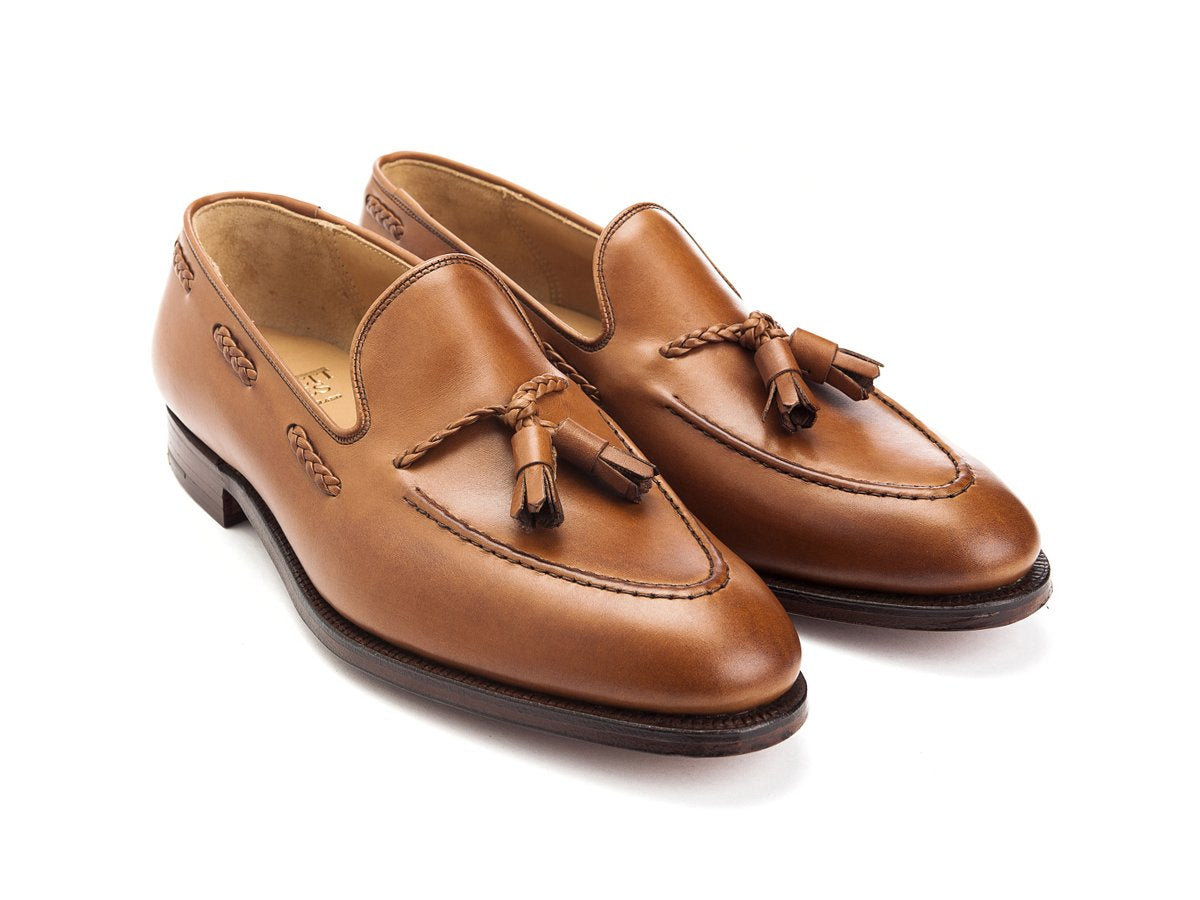 Front angle view of Crockett & Jones Langham 2 braided tassel loafers in ivywood burnished calf