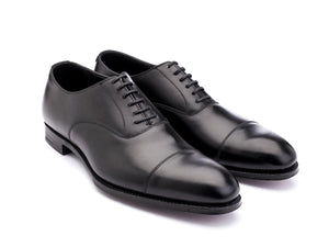 Front angle view of Crockett & Jones Lonsdale plain captoe oxford shoes in black calf
