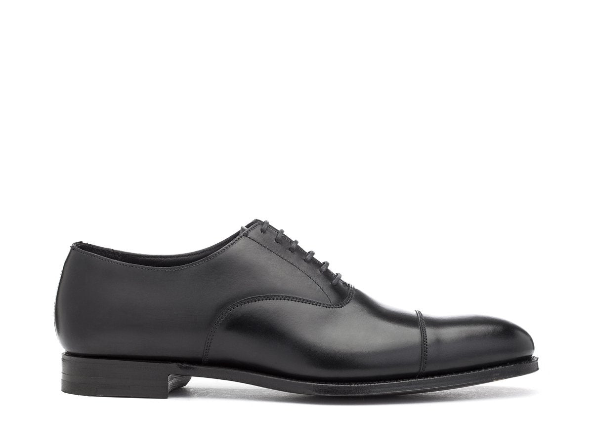 Side view of Crockett & Jones Lonsdale plain captoe oxford shoes in black calf