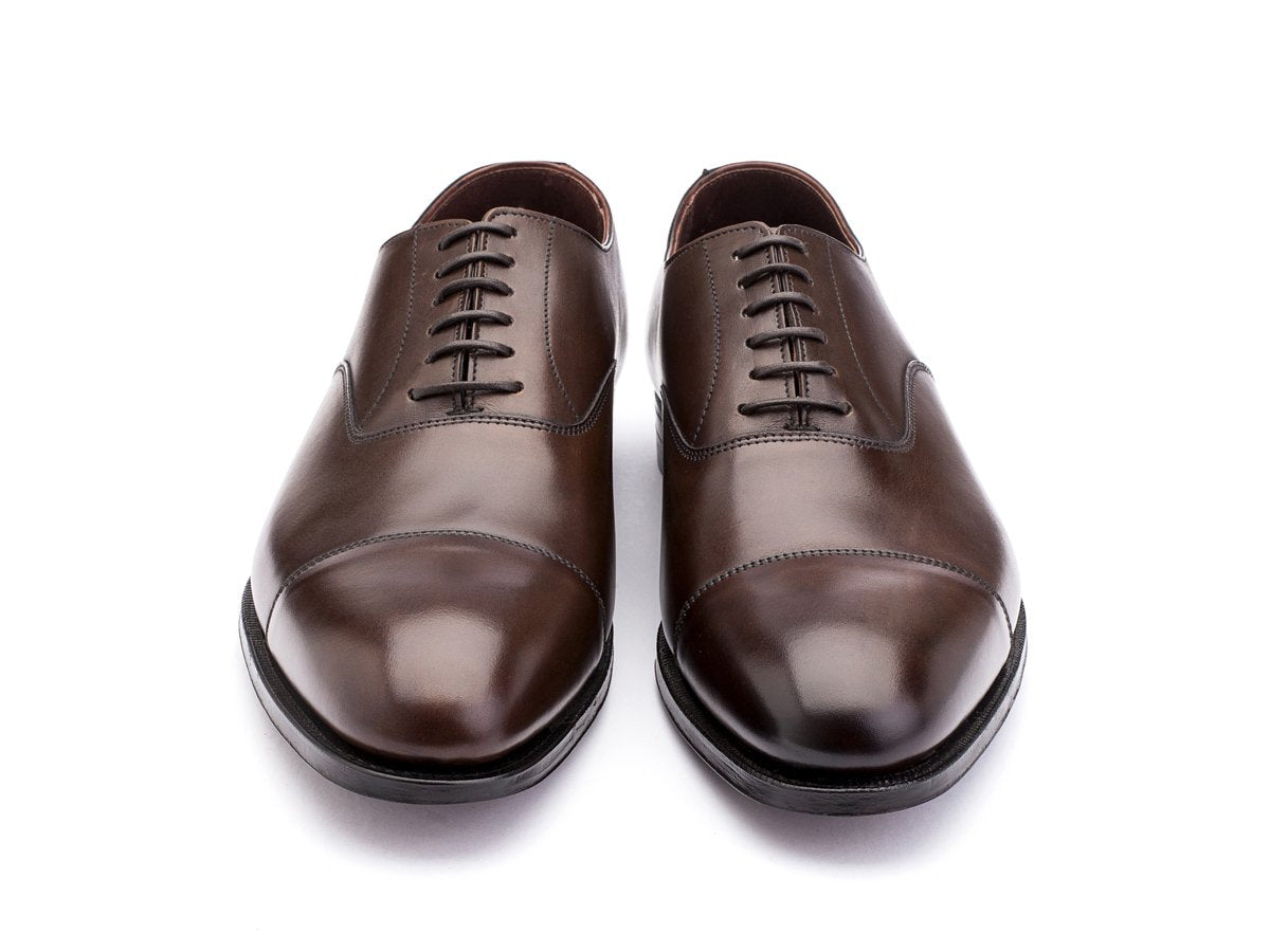 Front view of Crockett & Jones Lonsdale plain captoe oxford shoes in dark brown antique calf