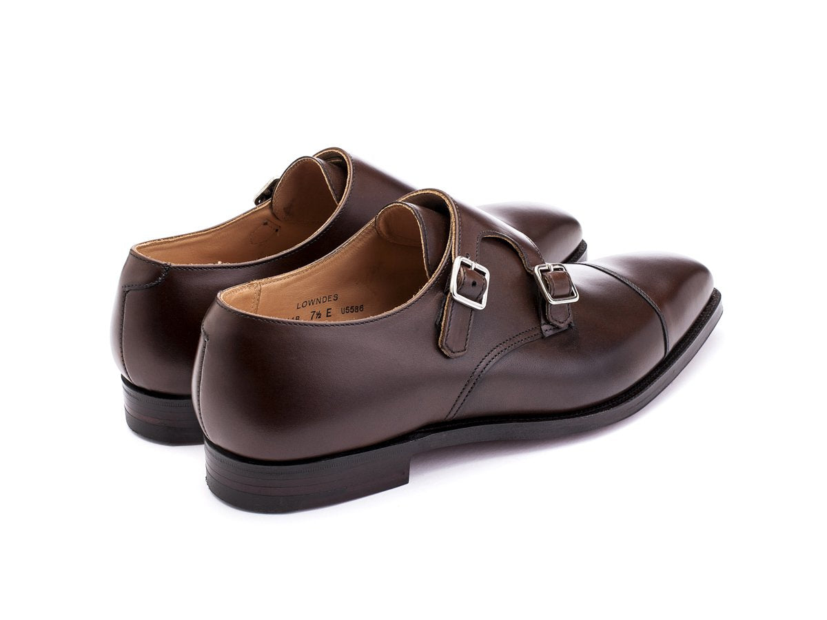 Back angle view of Crockett & Jones Lowndes captoe double monk strap shoes in dark brown burnished calf