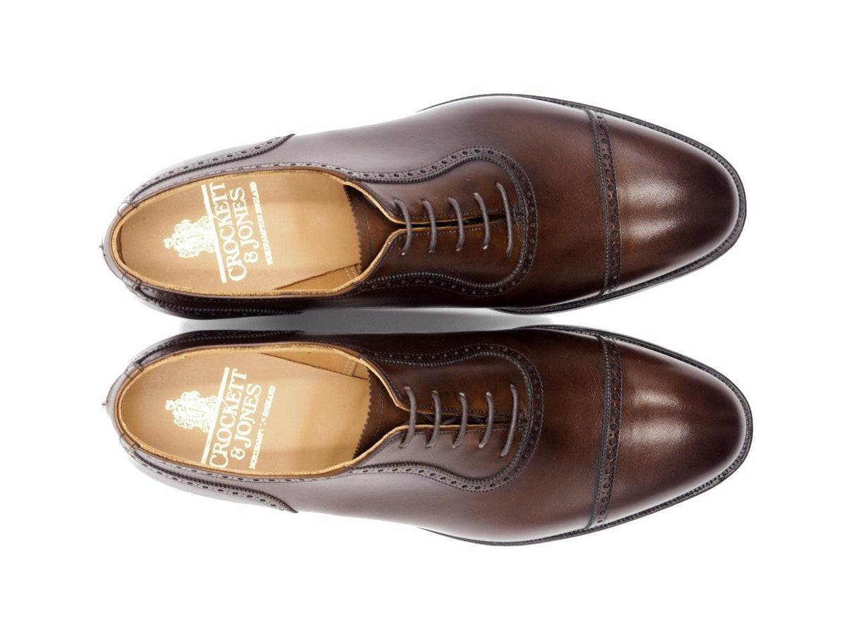 Top view of Crockett & Jones Macquarie 2 adelaide brogue oxford shoes in dark brown burnished calf