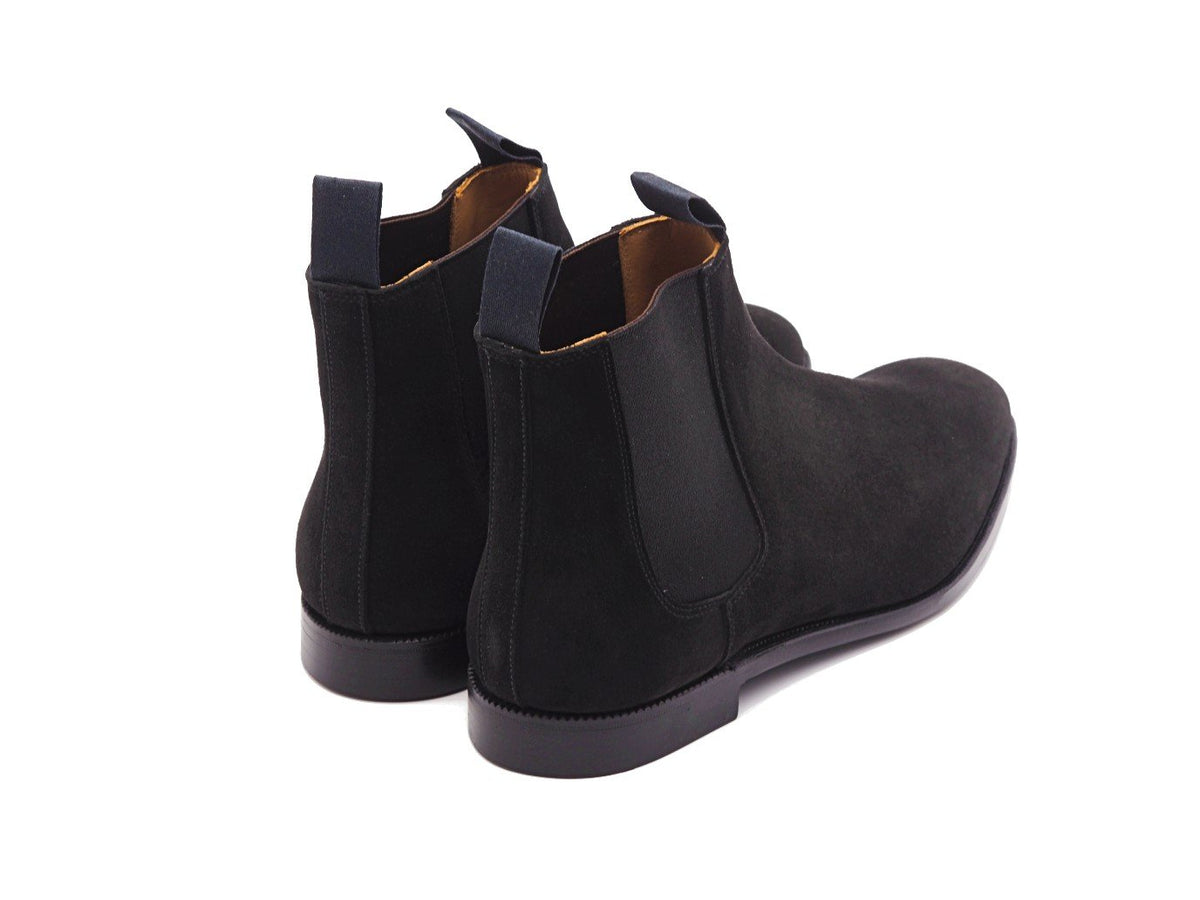 Back angle view of Crockett & Jones Maitland chelsea boots in black suede