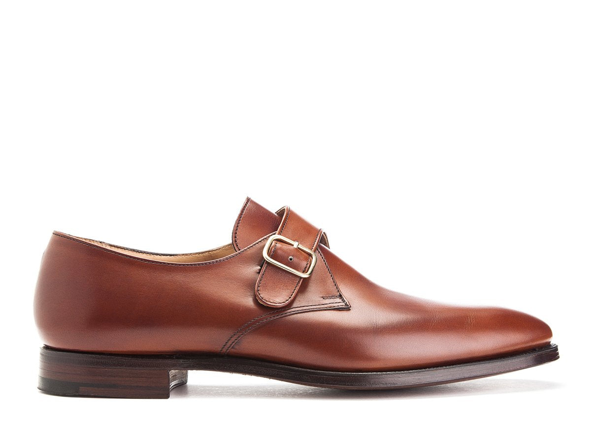 Side view of Crockett & Jones Malvern plain toe single monk strap shoes in chestnut burnished calf