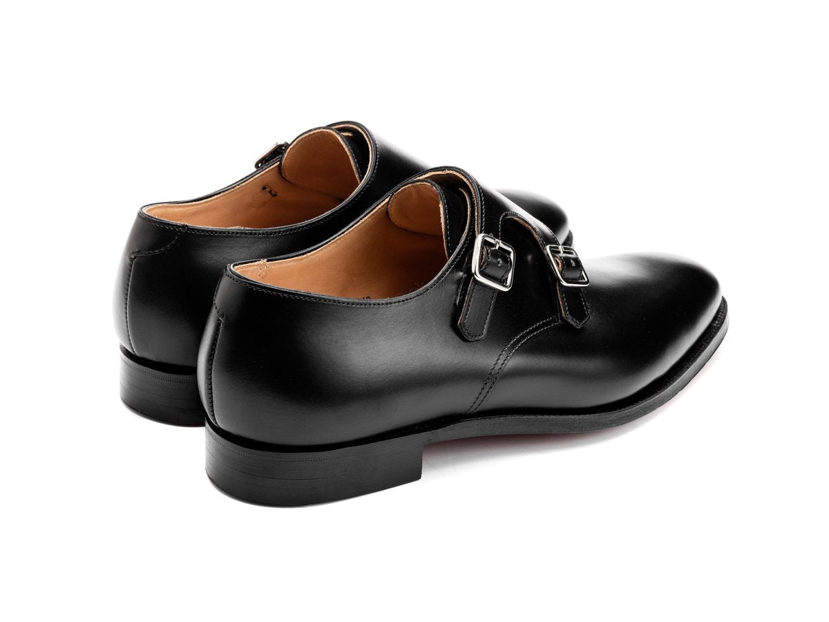 Back angle view of Crockett & Jones Melbourne plain toe double monk strap shoes in black calf