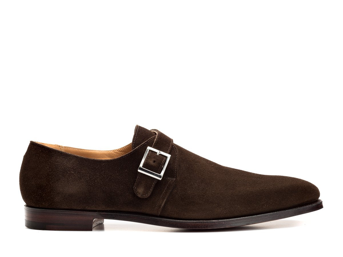 Side view of Crockett & Jones Monkton plain toe single monk strap shoes in dark brown suede