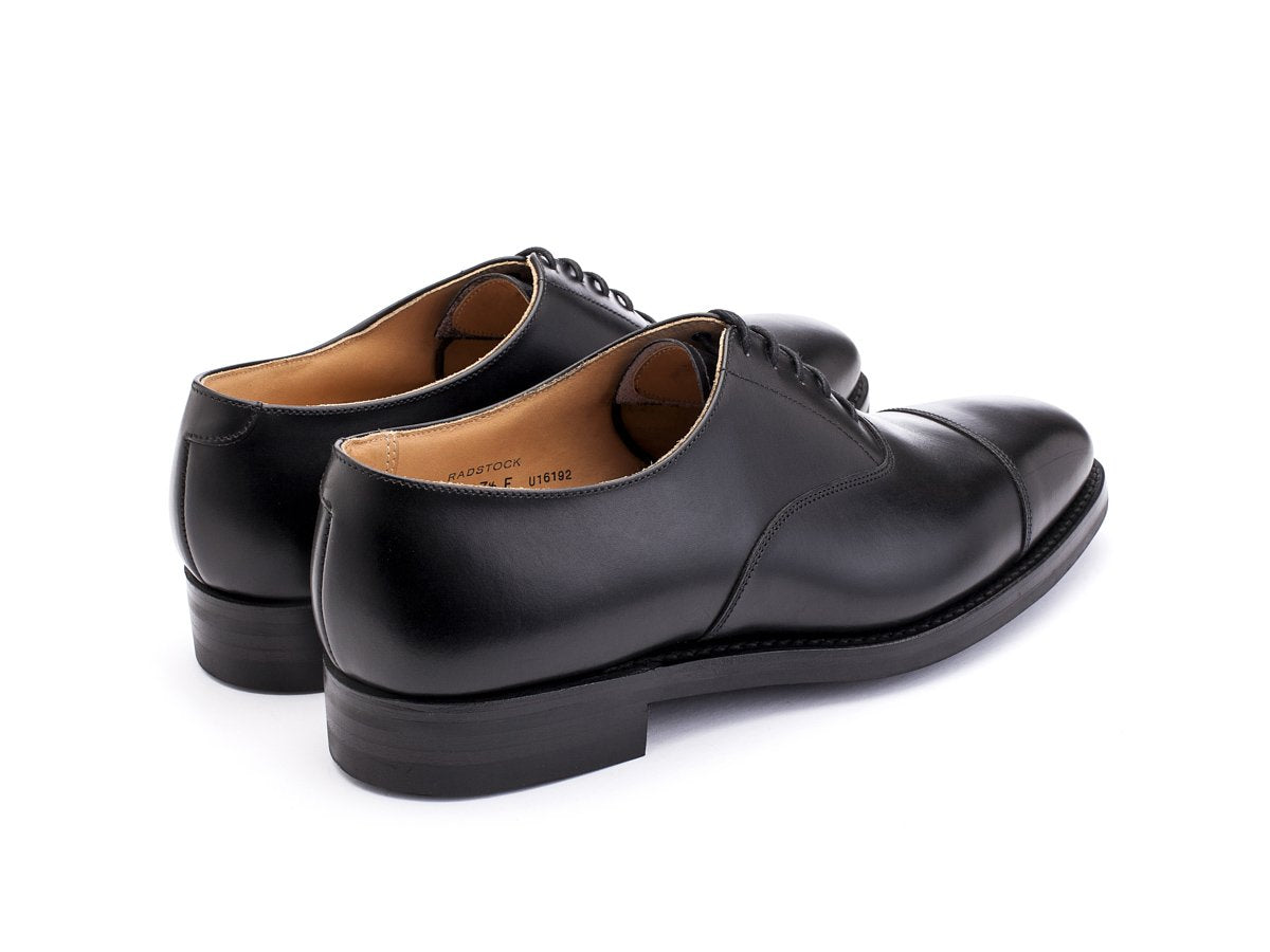 Back angle view of Crockett & Jones Radstock plain captoe oxford shoes in black calf