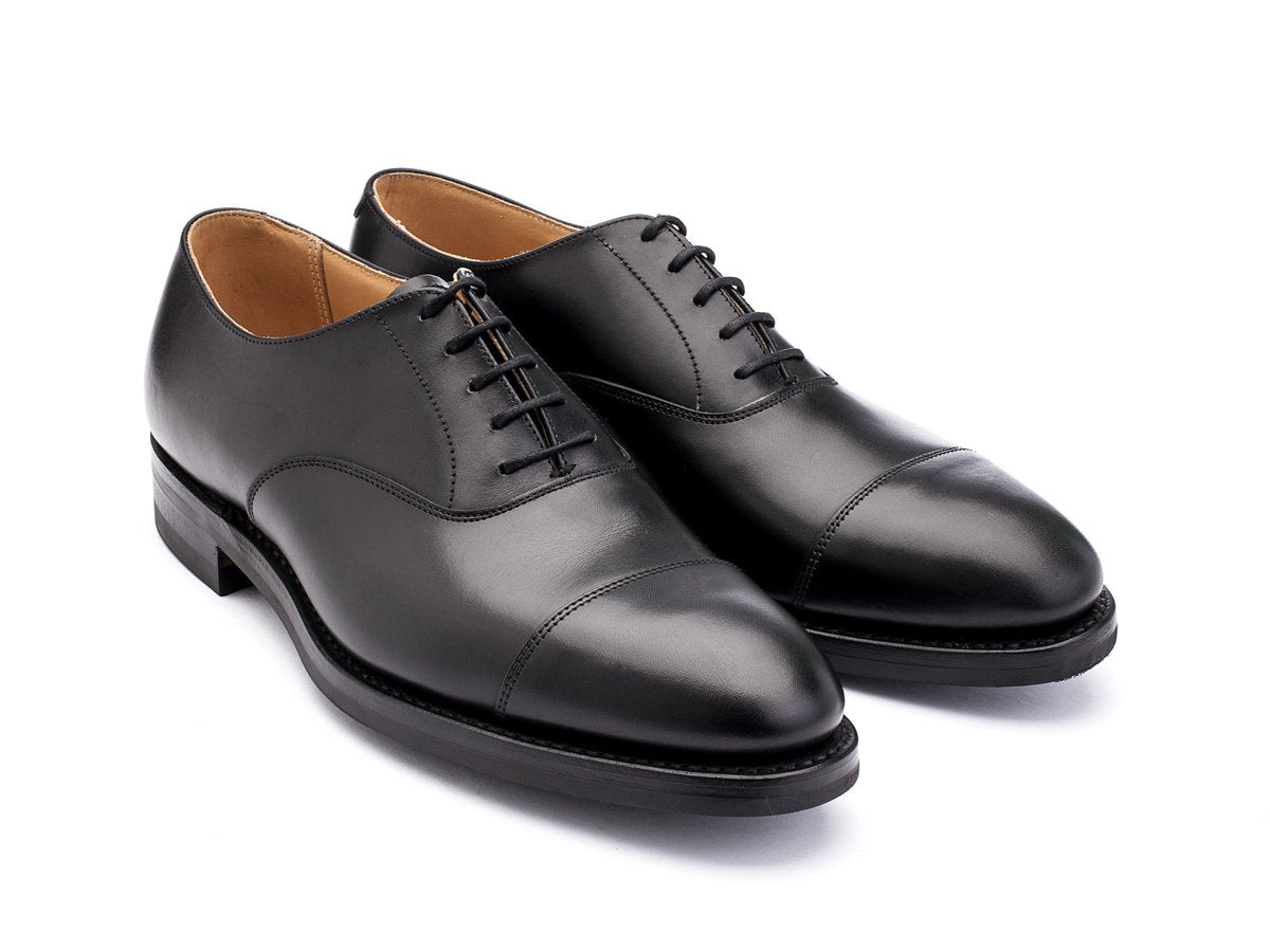 Front angle view of Crockett & Jones Radstock plain captoe oxford shoes in black calf