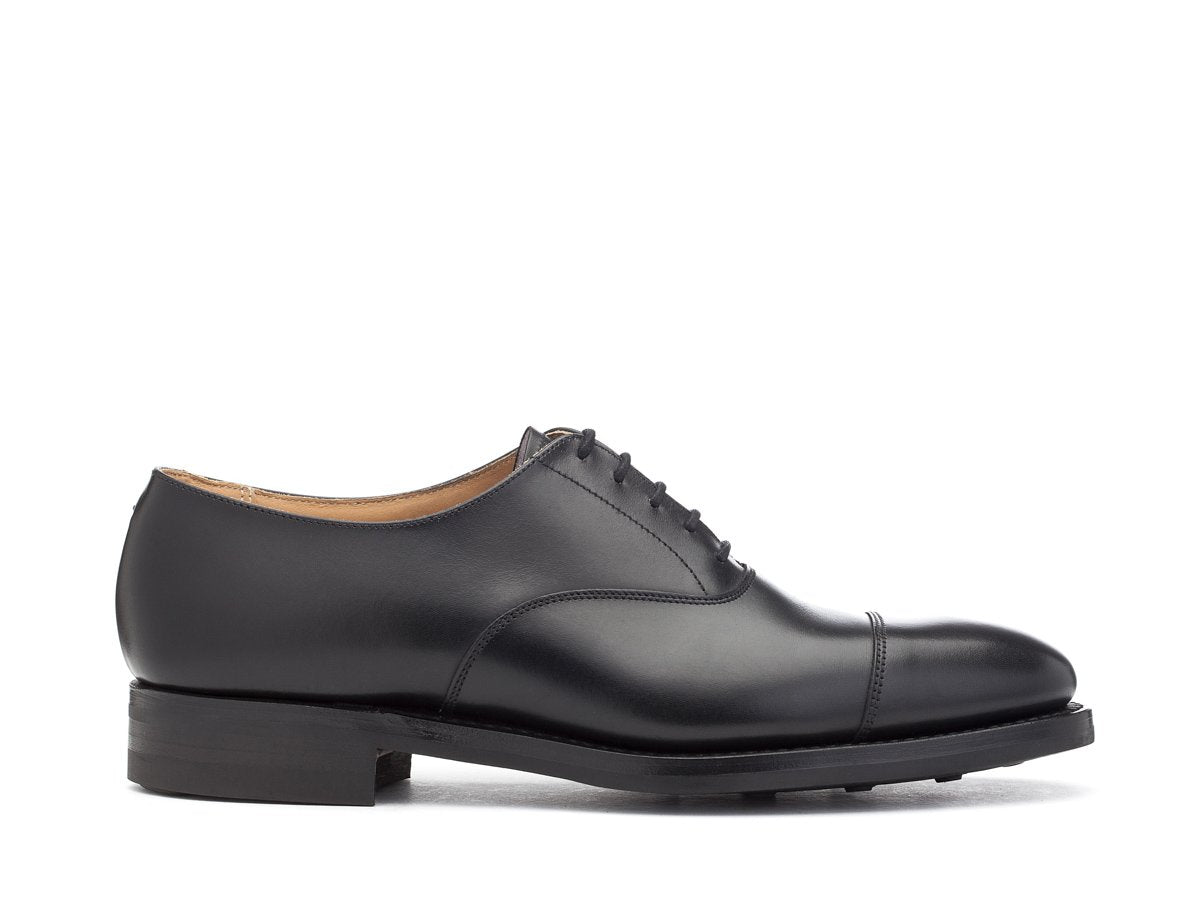 Side view of Crockett & Jones Radstock plain captoe oxford shoes in black calf